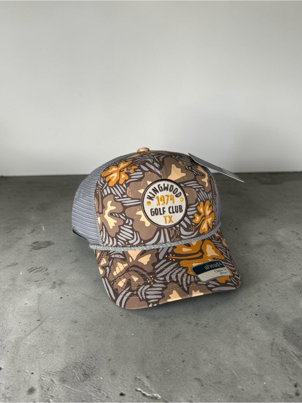 Ahead 1974 Golf Club TX Floral Trucker Hat - Brown/Yellow